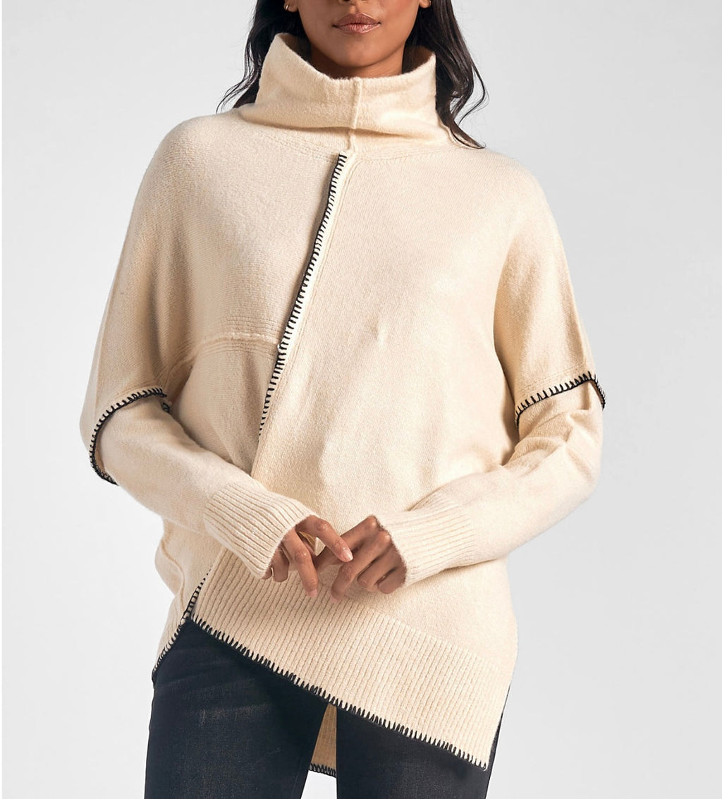 The Cream/Black Turtleneck Sweater
